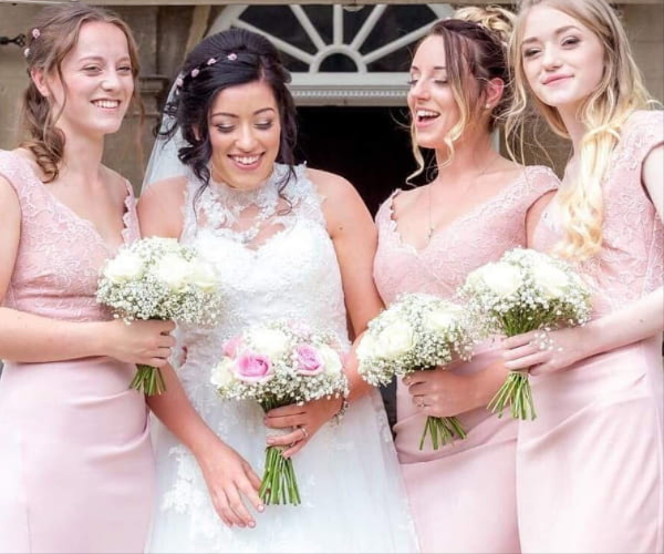Bridal and bridesmaid bouquets created by Poppies Florist