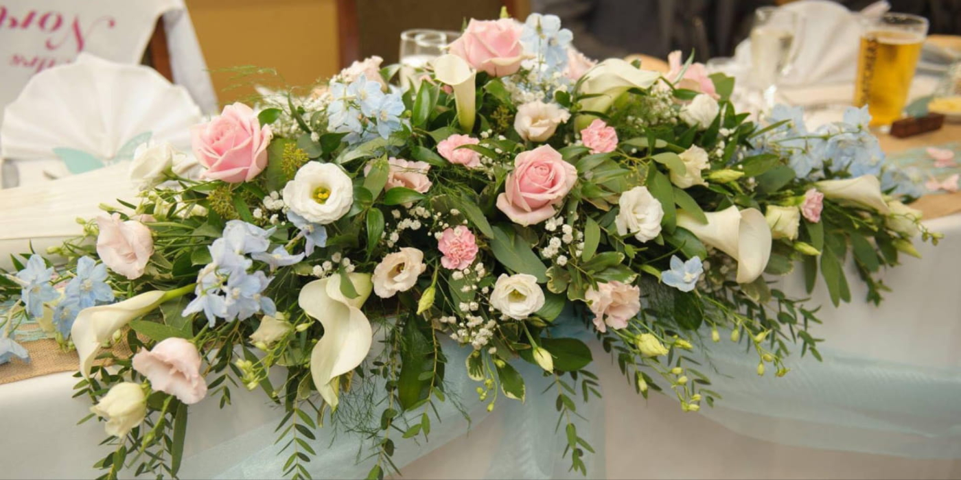 Beautiful wedding flowers created by Poppies Florist in Yeovil