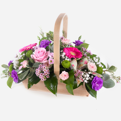 Poppies Bon Bon - Shower them with love with this cutesy collection of seasonal flowers in pretty pastels.  Beautifully arranged and stylishly presented in a traditional basket